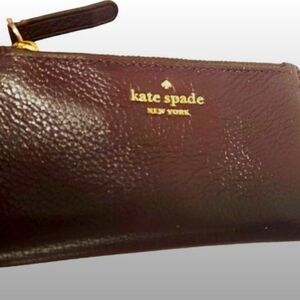 Kate Spade New York Burgundy wallet.